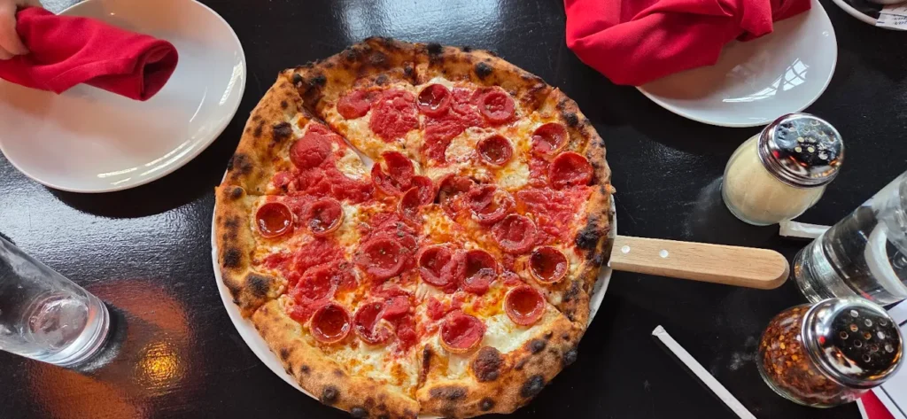 Buy One Pizza, Get One 50% Off