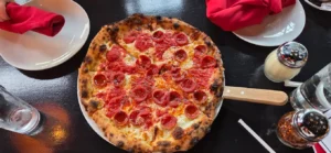 Buy One Pizza, Get One 50% Off